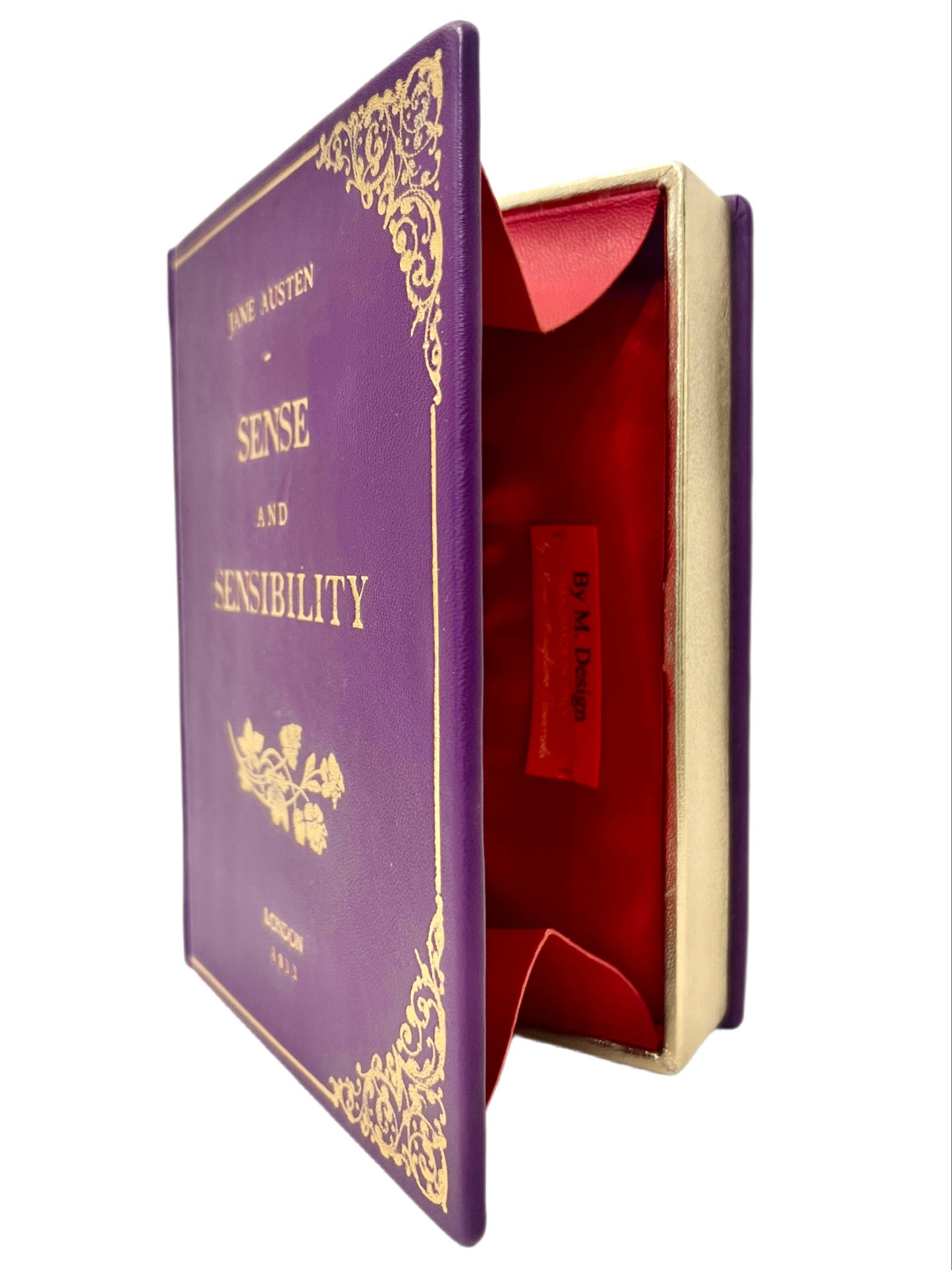 Leather book clutch bag by M. Design bookbindery silk lining