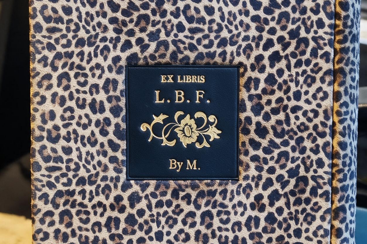 ex libris personalised by m book clutch on limited edition animal pattern leather