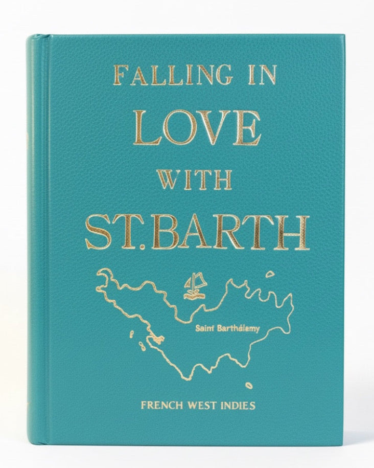 Book -clutch titled 'Falling in Love with St. Barth' on a white background
