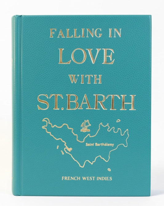 Book -clutch titled 'Falling in Love with St. Barth' on a white background