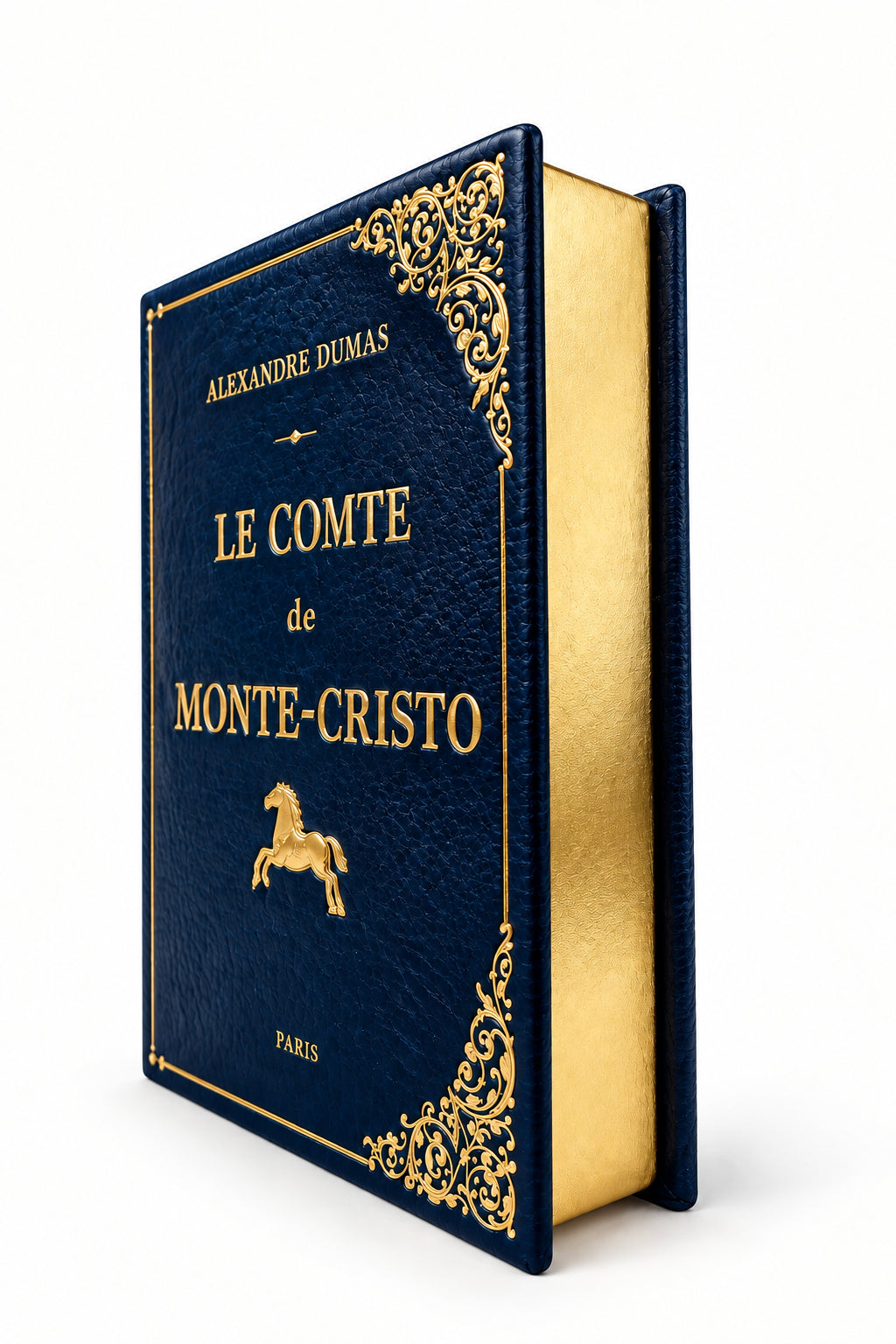 A vintage-style hardcover book of 'Le Comte de Monte-Cristo' by Alexandre Dumas, featuring a textured navy blue cover with ornate gold filigree corners and gold lettering, set against a plain white background.